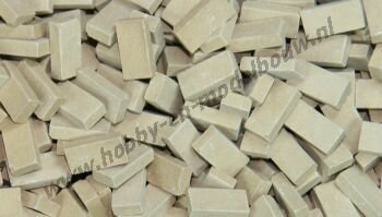 Donkerbeige steen 1:43/50. Afm.: 5,3 x 2,6 x 1,3 mm